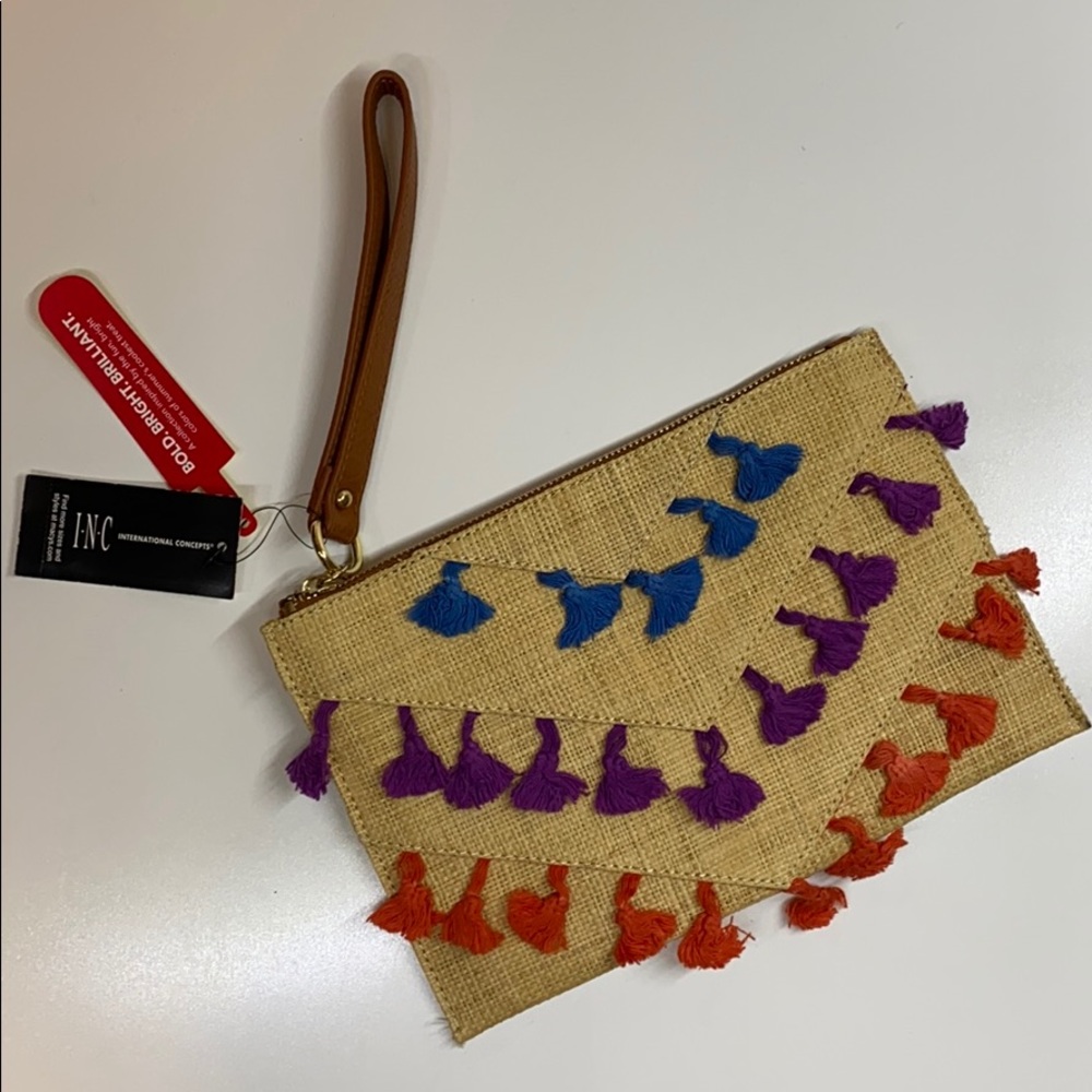 INC Popsicle pompom wristlet with tassels